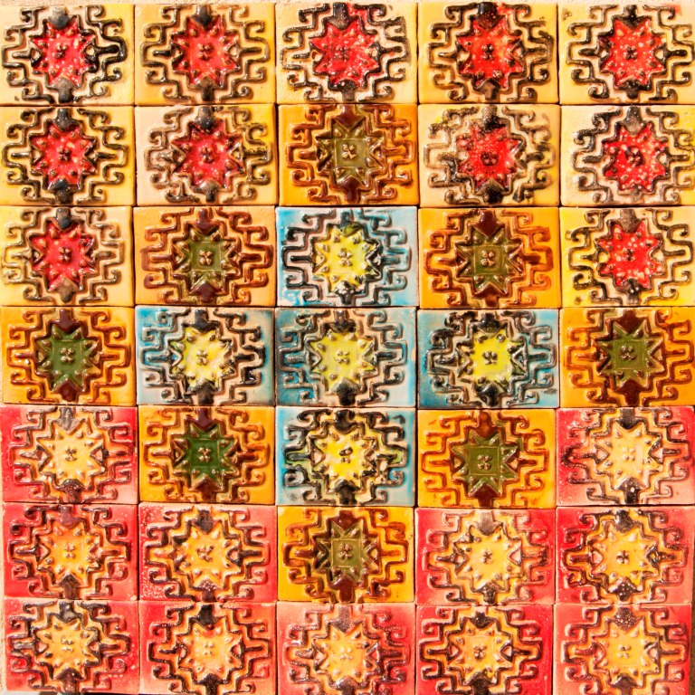 Designing Ceramic Tiles with Carpet Motifs